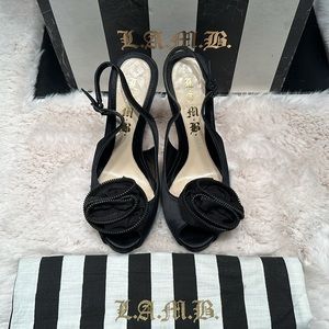 L.A.M.B. Black stain peep toe platform pumps with zipper rose.